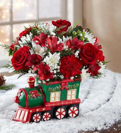 Red Roses, white chrysanthemums, red carnations arranged in a ceramic train